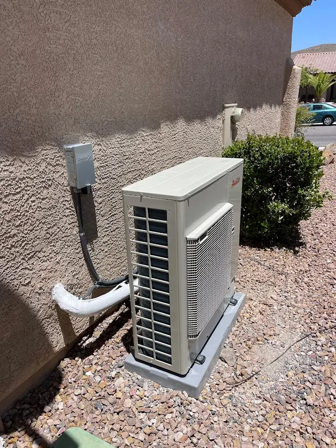Residential air conditioning condenser unit in Berwyn